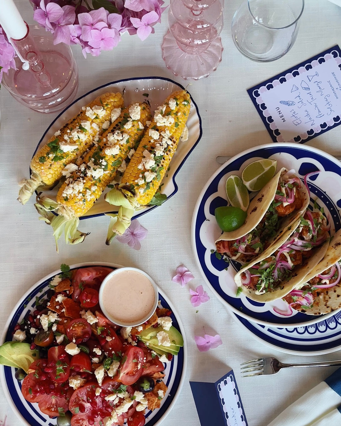 Elotes with a photo of Tori enjoying them at her table. @intothesauce, Into the Sauce, Tori Falzon, #intothesauce