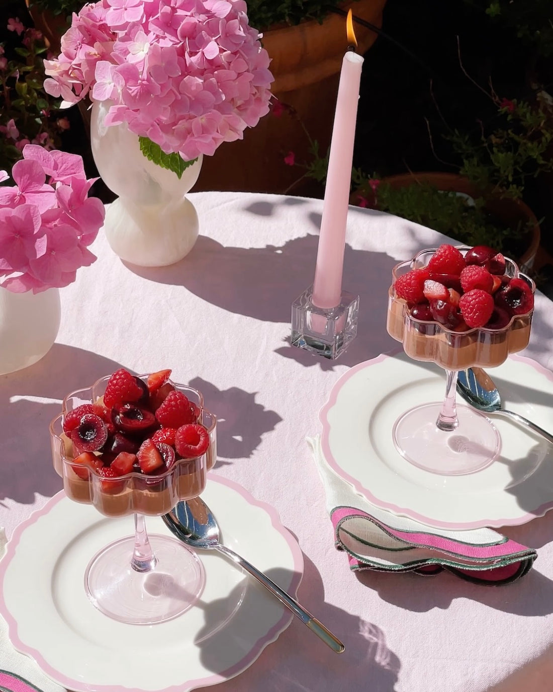 An outdoor table with chocolate mousse on the left. The gathered ingredients are on the right. @intothesauce, Into the Sauce, Tori Falzon, #intothesauce